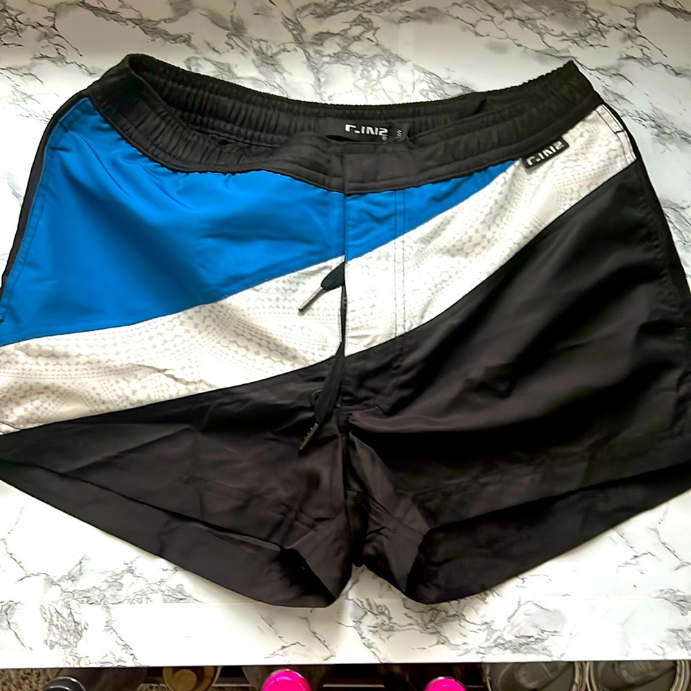 Size small swim shorts, new with  tags.